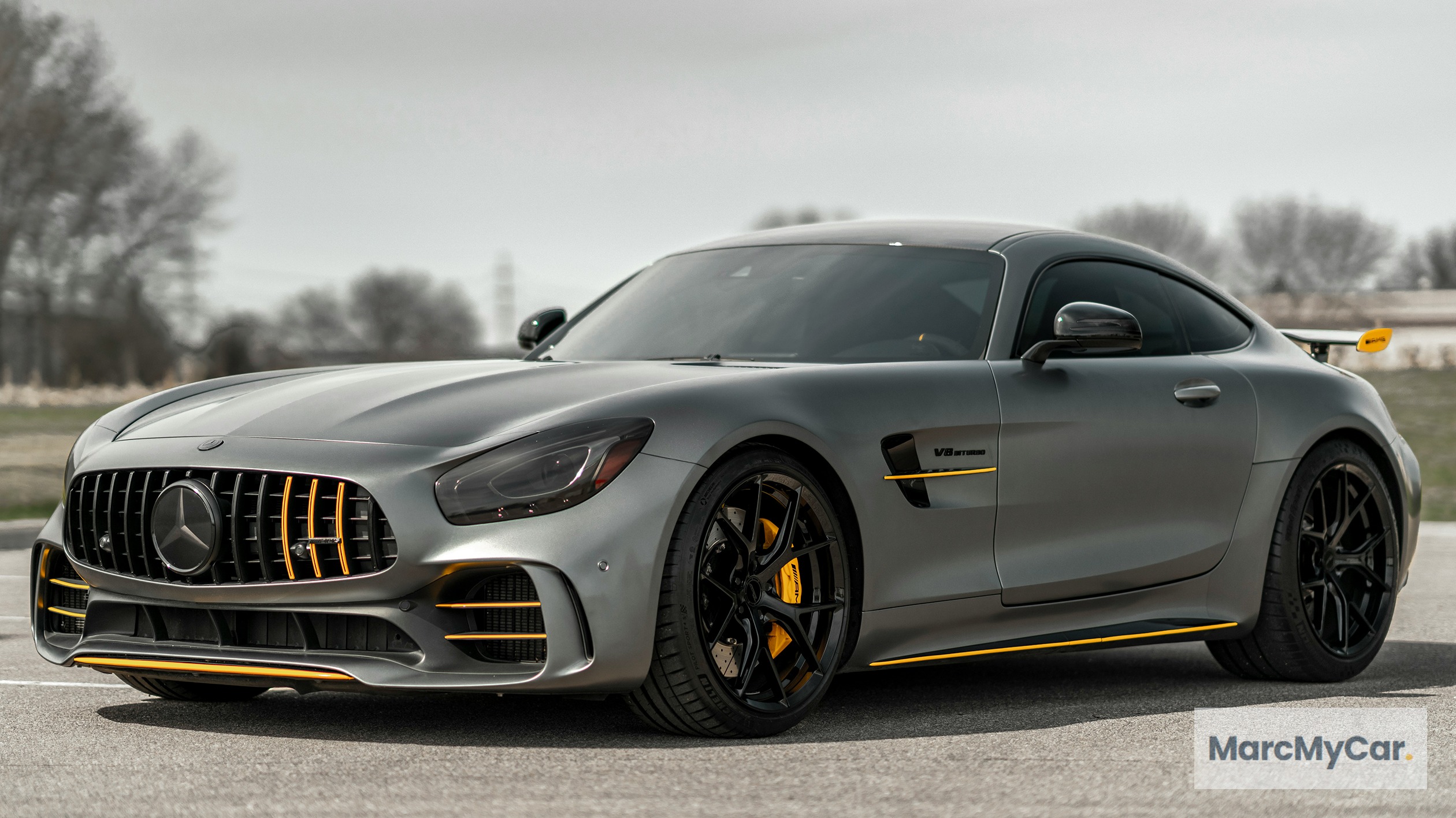 Professional dealership image overlay example on sports car